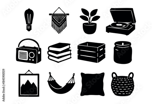 A collection of black silhouette icons representing trendy bohemian home decor and cozy lifestyle elements on a white background — stock vector.