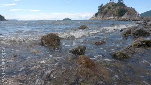 Whytecliff Park Summer Shoreline Low Tide 4K UHD.Whytecliff Park and Whyte Islet connected to shore at low tide. West Vancouver, British Columbia, Canada. 4K, UHD.
