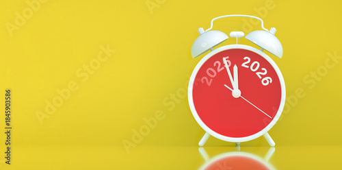 Vinatge Alarm clock turning 2025 into 2026 shows the New Year countdown of time transition, future planning, celebration and year end change while 2025 fading away