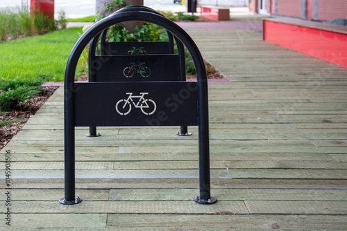 Принти на полотні A black metal bicycle parking rack