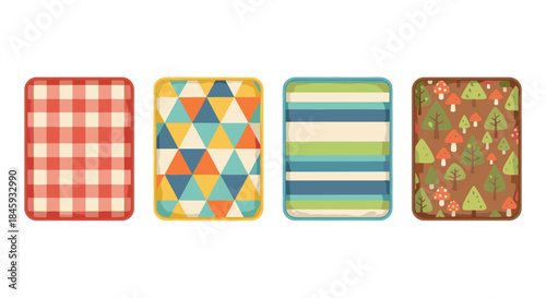 Four different patterned picnic blankets laid out side by side