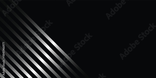 Abstract black background with diagonal silver metallic stripes creating a modern and sleek design.