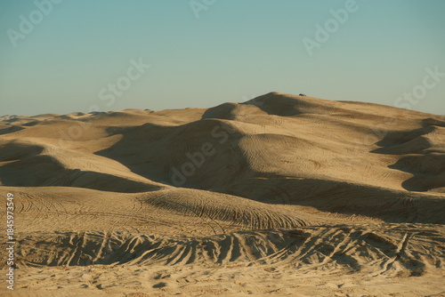 Empty Imperial sand dunes at Glamis california with OHV, dune buggies, ATV track marks