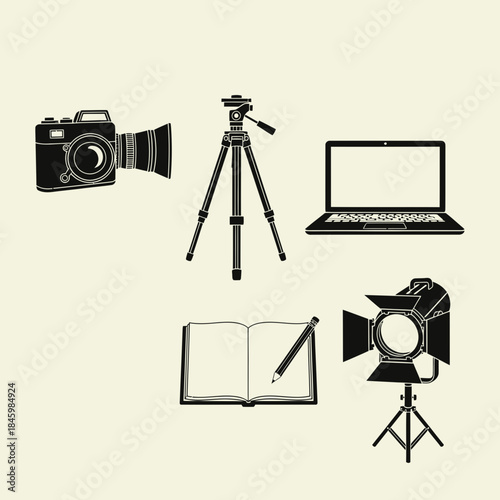 Modern creative studio setup with camera, laptop, notebook and studio lights, perfect for digital marketing, content creation and design projects