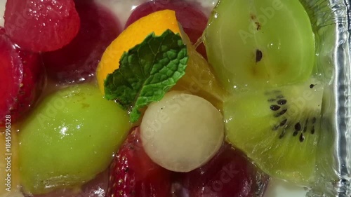 a soft, sweet, and refreshing dessert, made from a mixture of thickening agents with milk or coconut milk and pieces of real fruit which provide natural flavor as well as vitamin and fiber nutrition.