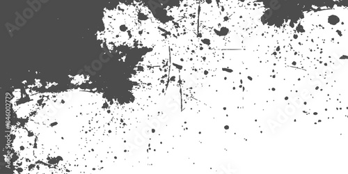 An abstract black ink splat grunge background featuring a messy paint splash texture with a dirty spray pattern and artistic vector splatter stains on a paper border frame element