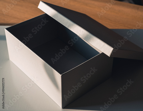 Open Empty White Box Mockup with Lid. Minimalist Packaging Template with Dramatic Shadow.