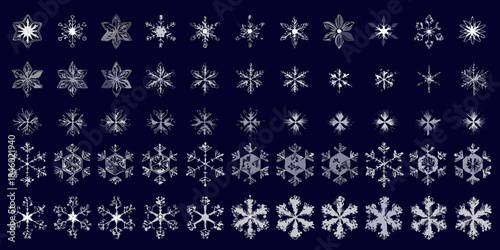 A collection of intricately detailed snowflake designs against a dark background