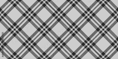 A stylish black and white plaid pattern featuring intersecting lines and shapes.