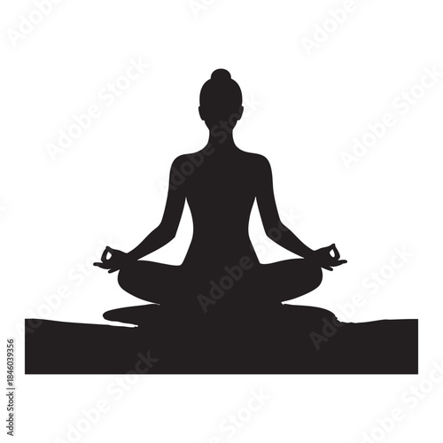 Silhouette of woman meditating in lotus pose yoga
