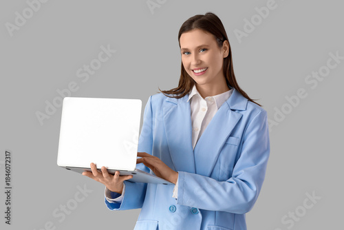 Young businesswoman working...