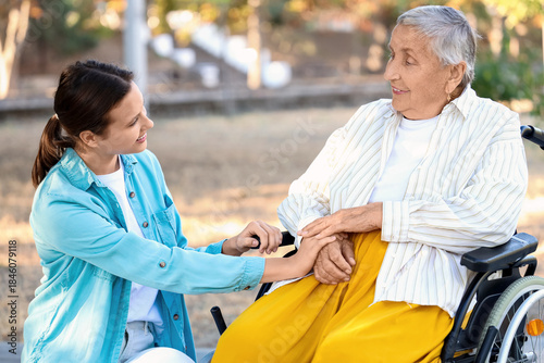 Caregiver with senior woman...
