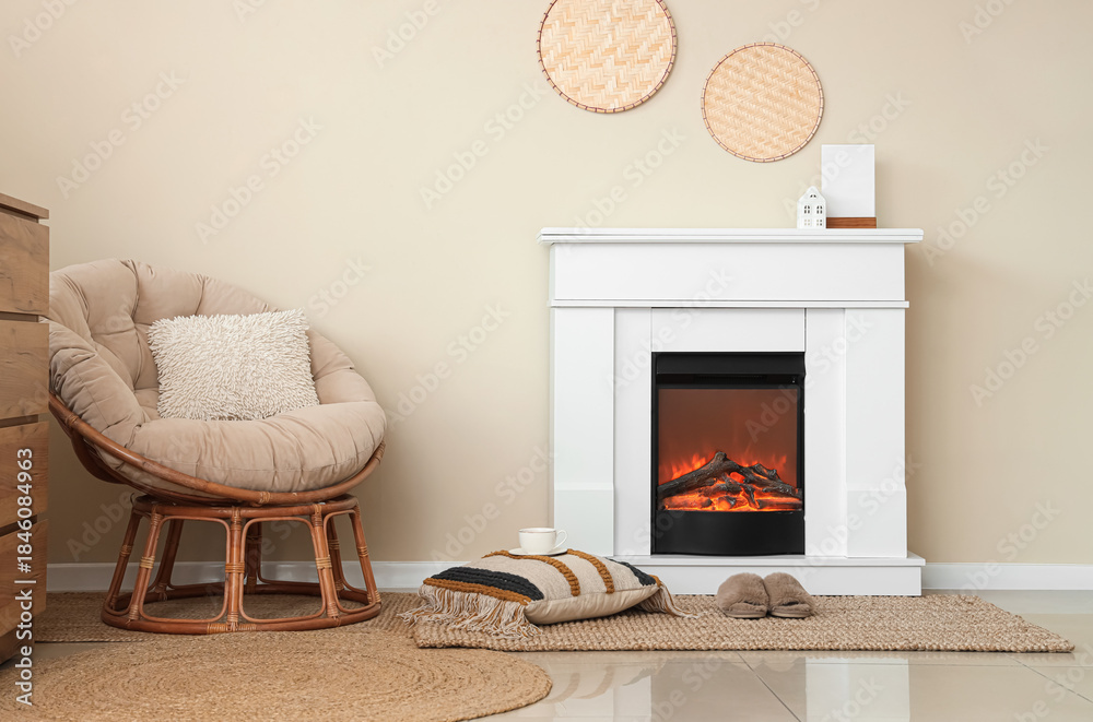 Fototapeta premium Interior of living room with fireplace, armchair and slippers