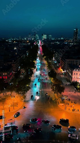 Panoramic view of the streets of Paris at night from the Arc de Triomphe, Paris, France, October 15, 2025. High quality 4k footage