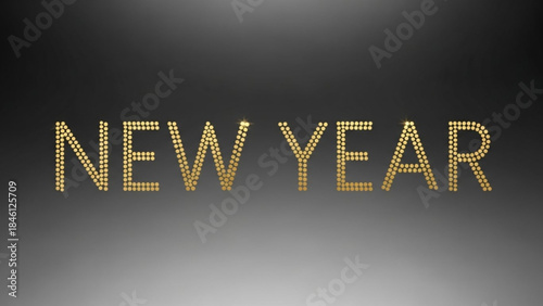Golden beads spelling new year on dark gradient background for celebration