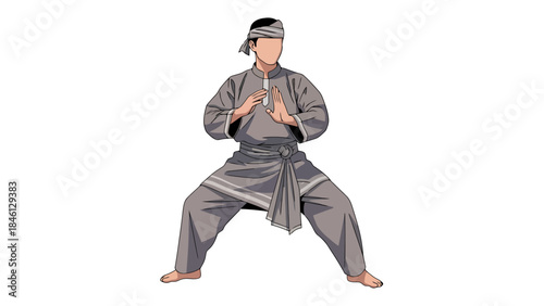 Martial artist practicing traditional martial arts in a dynamic stance