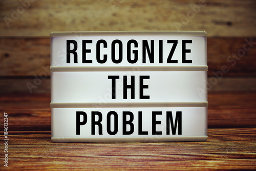 Photos Lightbox with text Recognize The Problem on wooden background