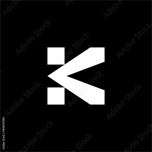 A strong, modern Letter K logo featuring sharp, geometric blocks. Elegant and futuristic, ideal for a corporate finance or investment firm.