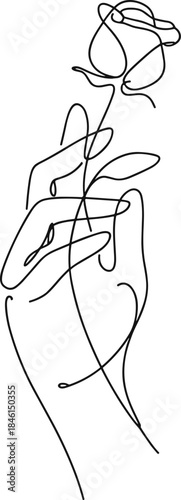 Hand holding a rose with a ring on the finger