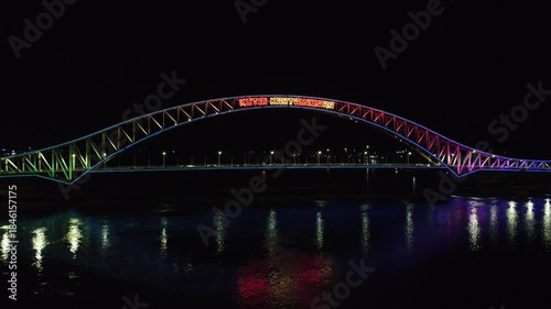 Kutai Kartanegara Bridge, East Kalimantan Indonesia, Night aerial view with car and motorcycle traffic in the middle of the bridge October 27 2021