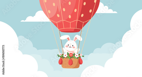 A cute white bunny smiles from the basket of a red hot air balloon floating among the clouds in a beautiful blue sky.