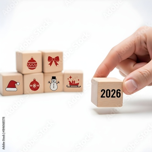 Happy New Year 2026 Celebration with Christmas Decorations and Festive Symbols on Wooden Blocks