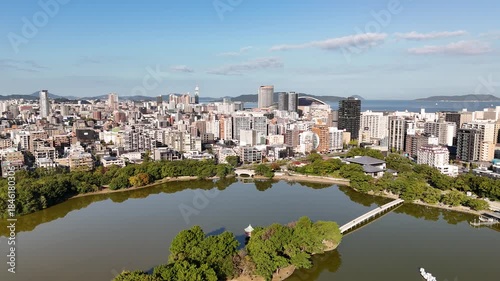Fukuoka City, Kyushu, Japan – 4K Aerial Drone Footage of City Skyline, CBD, Ohori Park, Maizuru Park, Urban Lakes, Autumn Trees, Harbour, Port Area, Modern High-Rise Architecture, Houses and Apartment