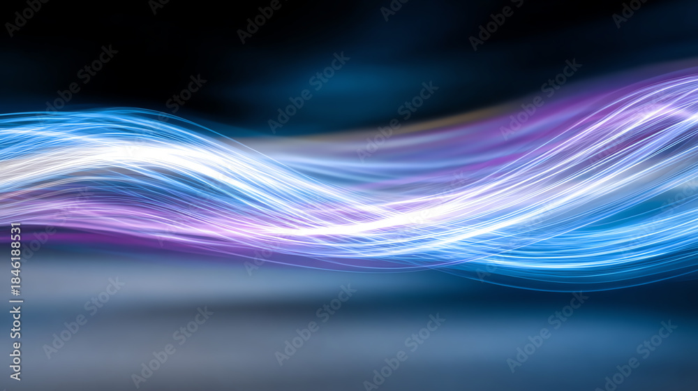 Fototapeta premium Abstract light waves in vibrant hues create a mesmerizing visual effect, perfect for backgrounds or creative projects.