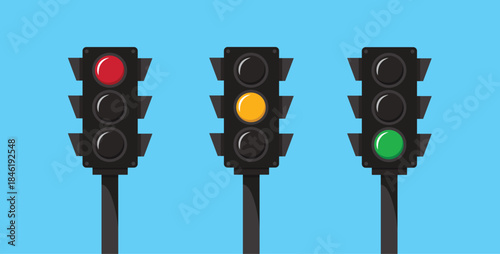 Red, Yellow, and Green Traffic Signals on Blue Background