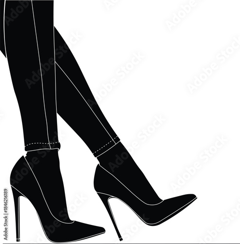 Silhouette of a lady's legs wearing jeans and a pair of stiletto high heels side view. 