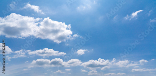 Clouds in the blue sky, Panoramic stage by light background during the summer day.