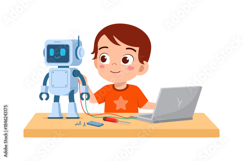 Happy young boy smiling and learning robotics building a cute robot with laptop and tools on a desk