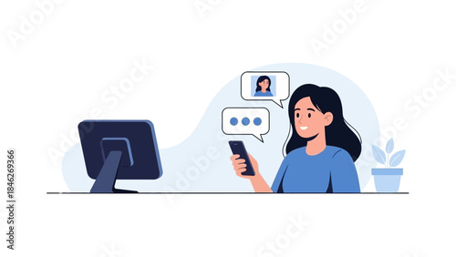 woman communicating digitally with smartphone and computer in modern workspace