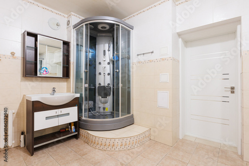 modern bathroom room with toilet and washing machine