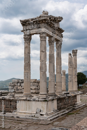 Ruins of the Temple of Trajan at ancient Pergamon, Bergama, Turkey. Roman columns against a cloudy sky