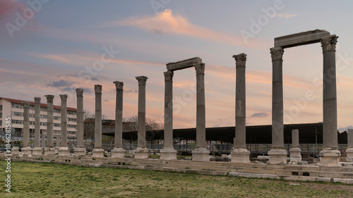 Ancient Roman columns of the State Agora of Smyrna at sunset. A historical landmark and archaeological site in the city of Izmir, Turkey