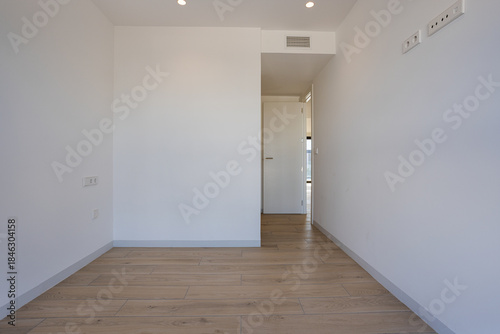 Wallpaper Mural Empty modern bedroom with wooden floor and recessed lighting Torontodigital.ca