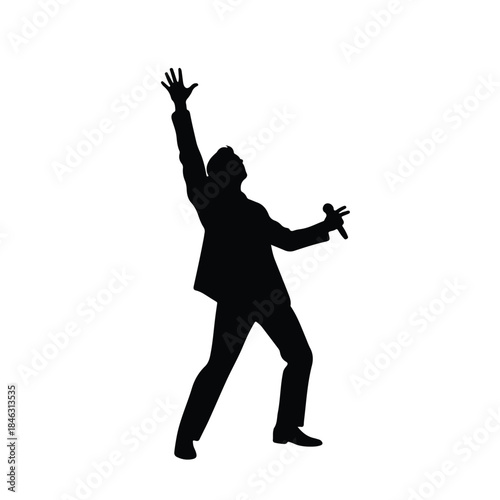 Silhouette of a charismatic performer with microphone and raised arm