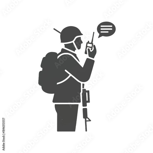 Soldier communicating via radio in military operation with rifle