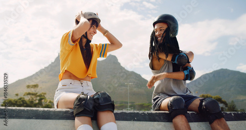 Fotografie Rollerskate, relax and ramp with interracial couple at park for support, skating game and training
