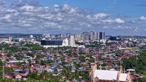 Wallpaper Mural Aerial view Davao City Mindanao Philippines panning right to left showing downtown contrast of architecture. Torontodigital.ca