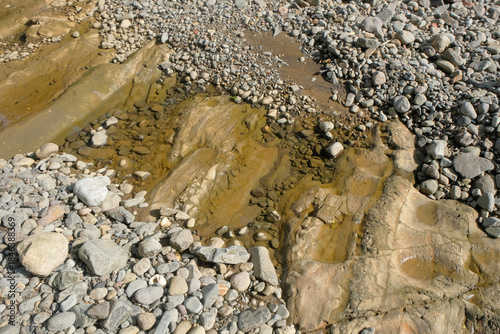 Intermittent river view in tropical forest mountains. River water puddles. For graphic design, 3D rendering and banners