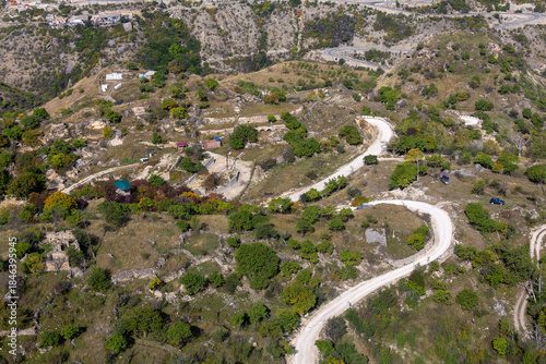Aerial view of a road winding across a mountain plateau