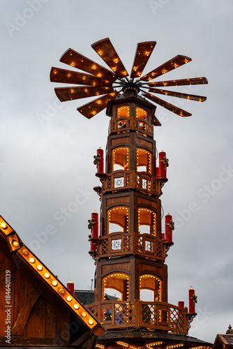 Wooden Christmas pyramid crepe and churros stand at Leuven winter market