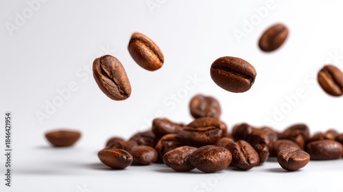 Freshly roasted coffee beans floating and piled in mid-air motion