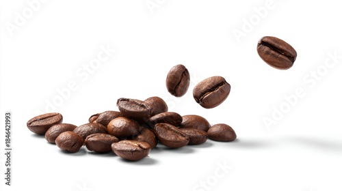 Freshly roasted coffee beans scattering mid-air against a bright background