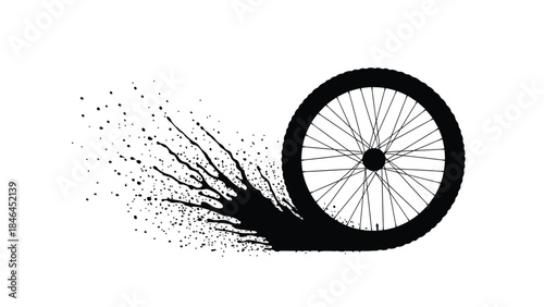 A spinning bicycle wheel leaving a trail of scattered dots and debris