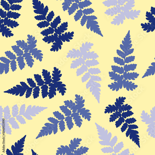 Refreshing botanical seamless pattern featuring various shades of blue fern leaves gracefully scattered across a soft pale yellow background, ideal for textile designs, digital papers, or home.