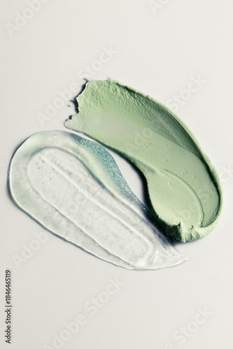 Macro texture shot of jelly facial scrub or cleanser and kaolin clay mask on neutral background