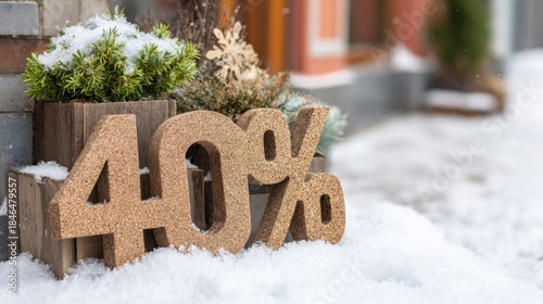 Wallpaper Mural Sale sign with 40 percent discount in snowy setting outside a store Torontodigital.ca